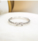 Anelli di fidanzamento di Diamond Rings 0.3ct Moissanite dell'oro di Bowknot 18K per nozze