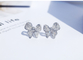Il platino Diamond Bow Stud Earrings 0.10ct CONTRO chiarezza 4.5gram ha personalizzato